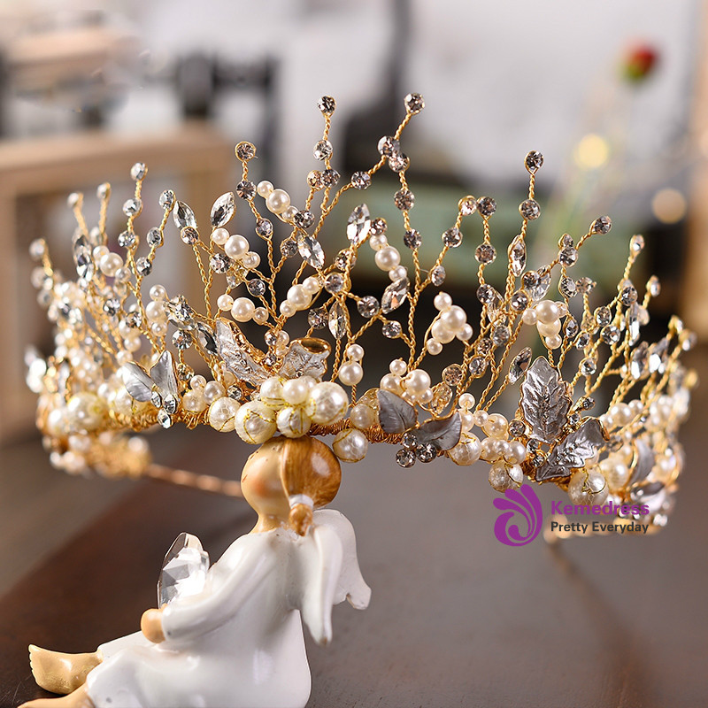 Handmade gold bridal headpiece with pearls, crystals and floral branch details
