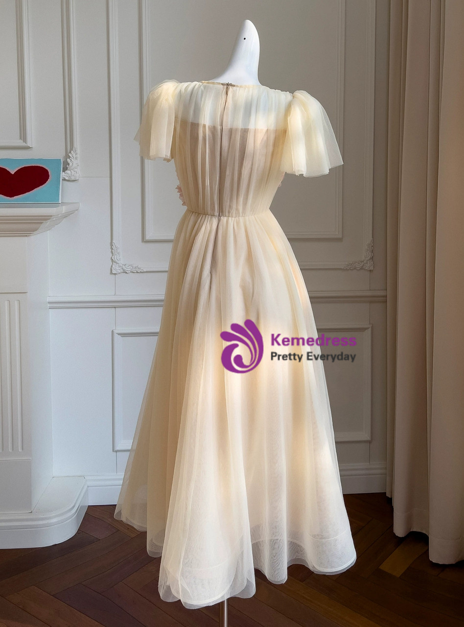 Champagne tulle dress bodice detail with pleats flowers and puff sleeves