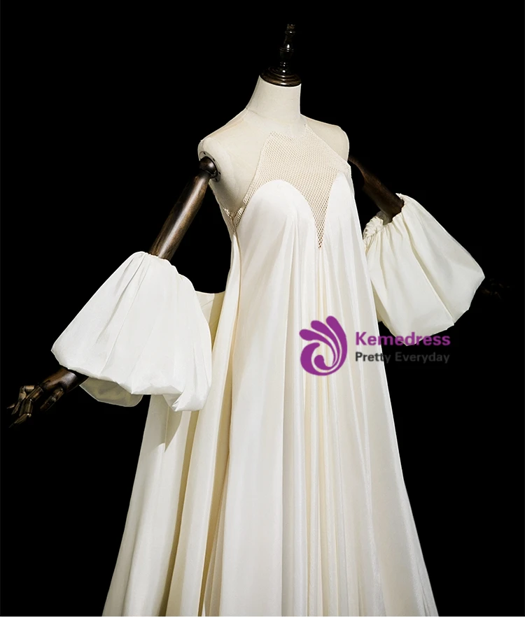 Pleated waist and satin draping detail on white halter wedding dress