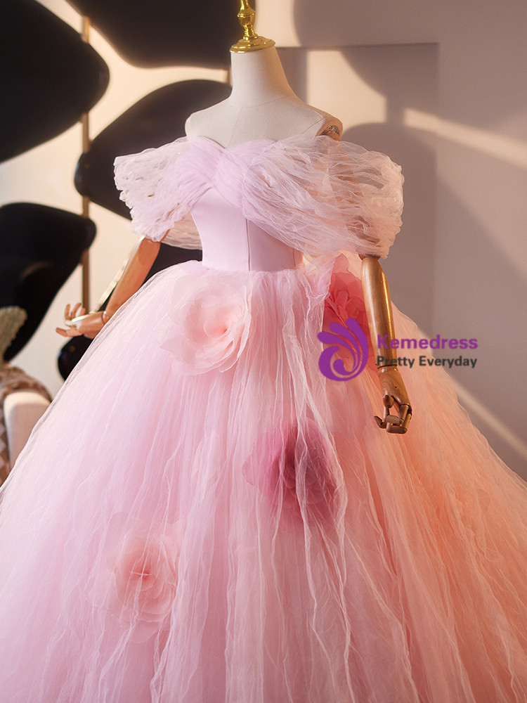 Close view of pink floral waist detail and ruffled off the shoulder bodice