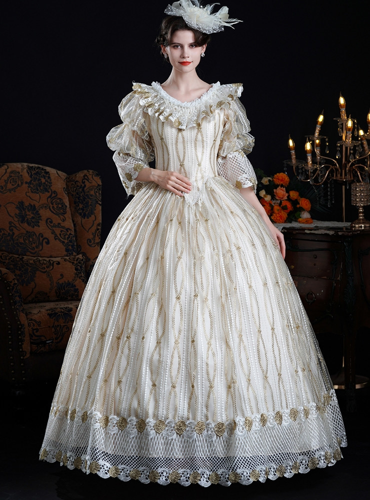 Champagne lace Rococo gown with gold bodice beading and layered ruffle sleeves