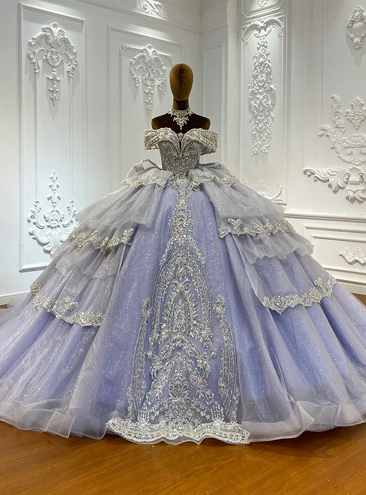 Purple tulle ball gown wedding dress with off shoulder neckline and beading