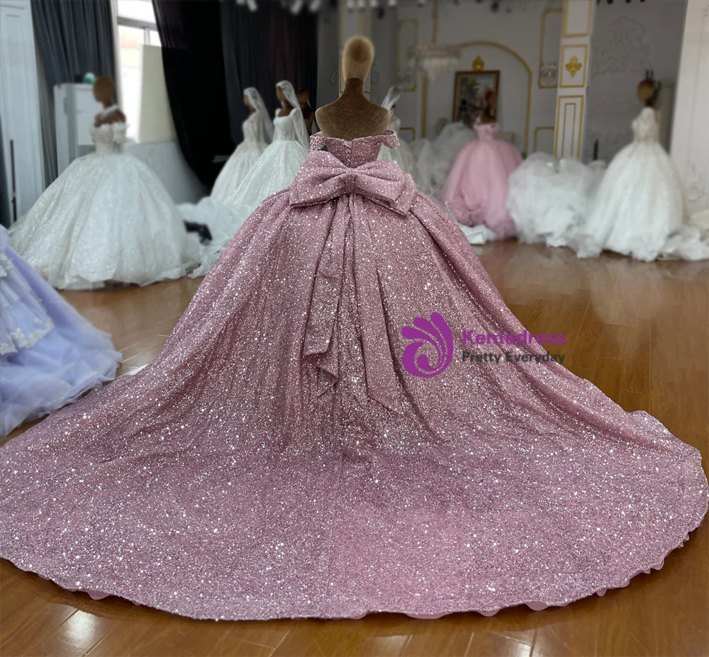 Pink sequin ball gown back with oversized bow