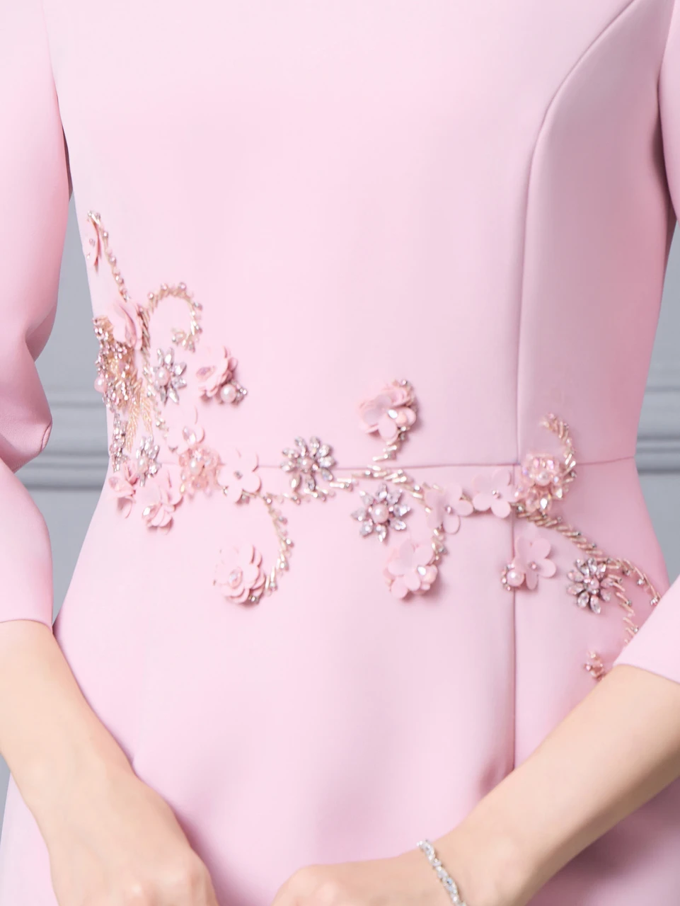 Pink three quarter sleeve mother of the bride dress with floral beading and crystal waist detail