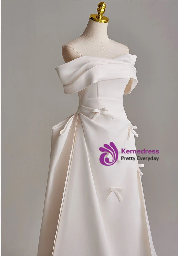 Ivory satin wedding dress pleated bodice and off shoulder detail