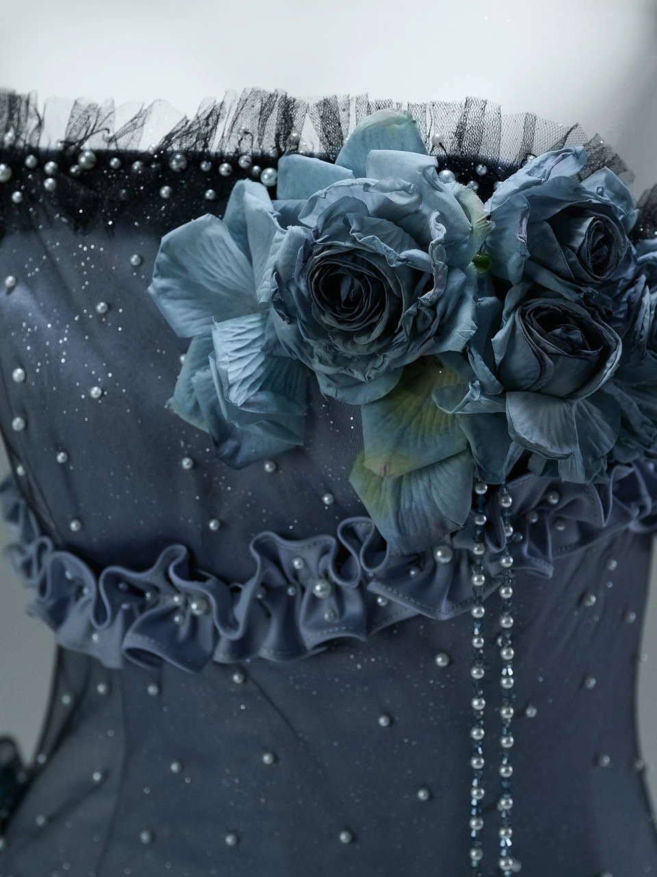 Blue quinceanera dress corset bodice with 3D blue roses and pearl detailing