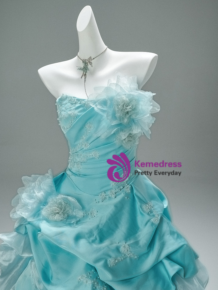 Blue strapless pleated ball gown prom dress with 3D floral details and layered skirt