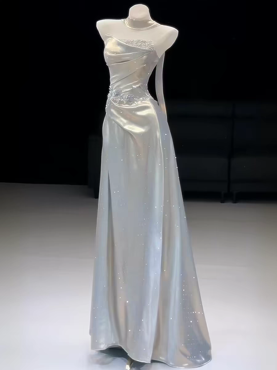Metallic satin pleated strapless evening gown with beaded appliques