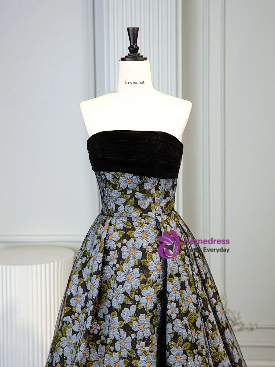 Black tulle strapless bodice and flowing floor length skirt detail
