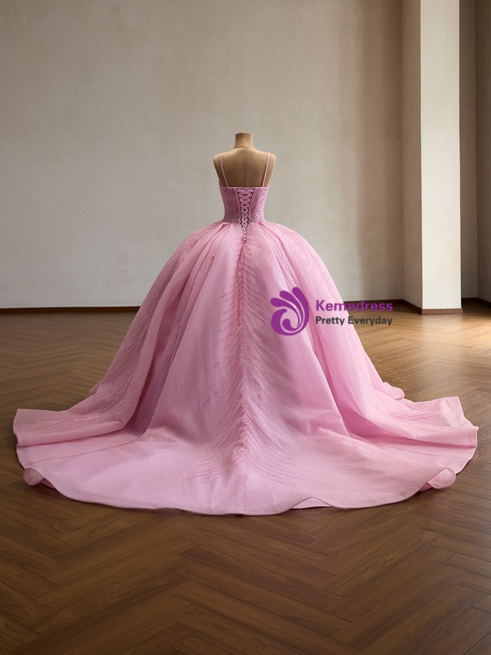 Back View of Pink Beaded Ball Gown Back view of pink beaded ball gown showing full skirt and train