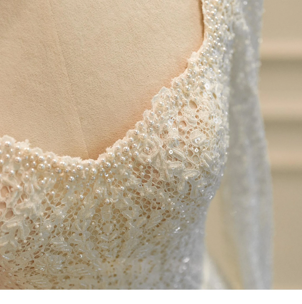 White lace mermaid wedding dress skirt and sweep train detail