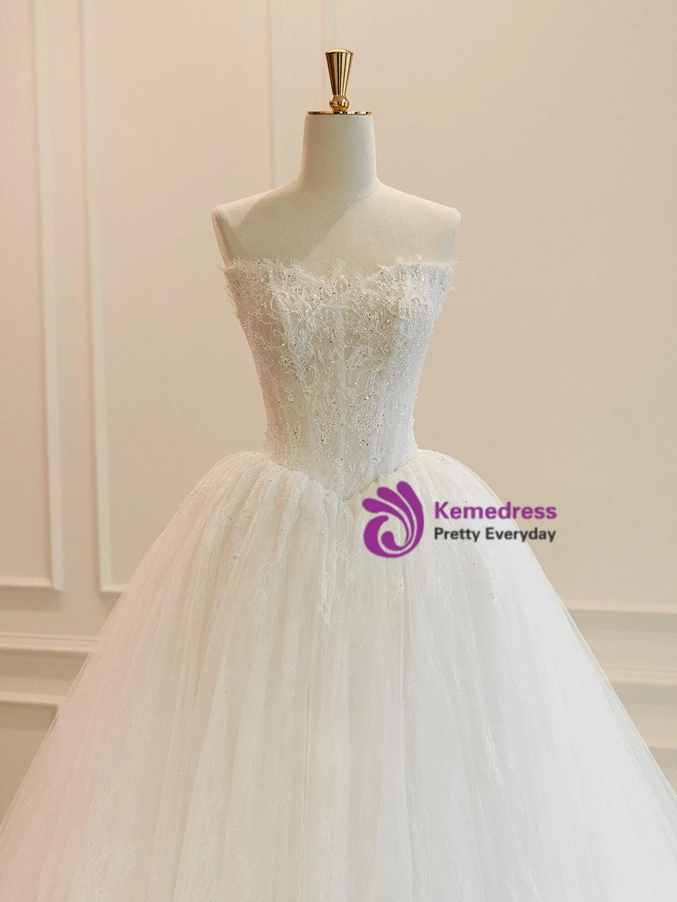White ball gown wedding dress detachable tulle sleeve and lace detail