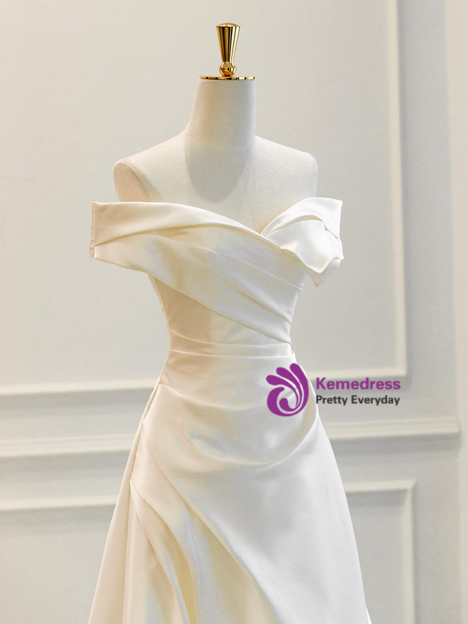 Close up of satin pleated bodice detail on minimalist wedding dress