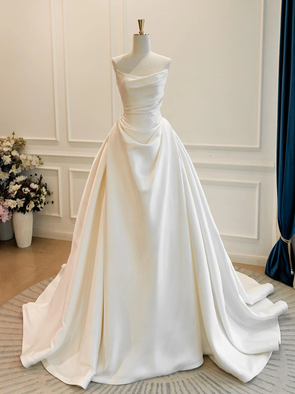 Ivory satin pleated strapless wedding dress bodice detail