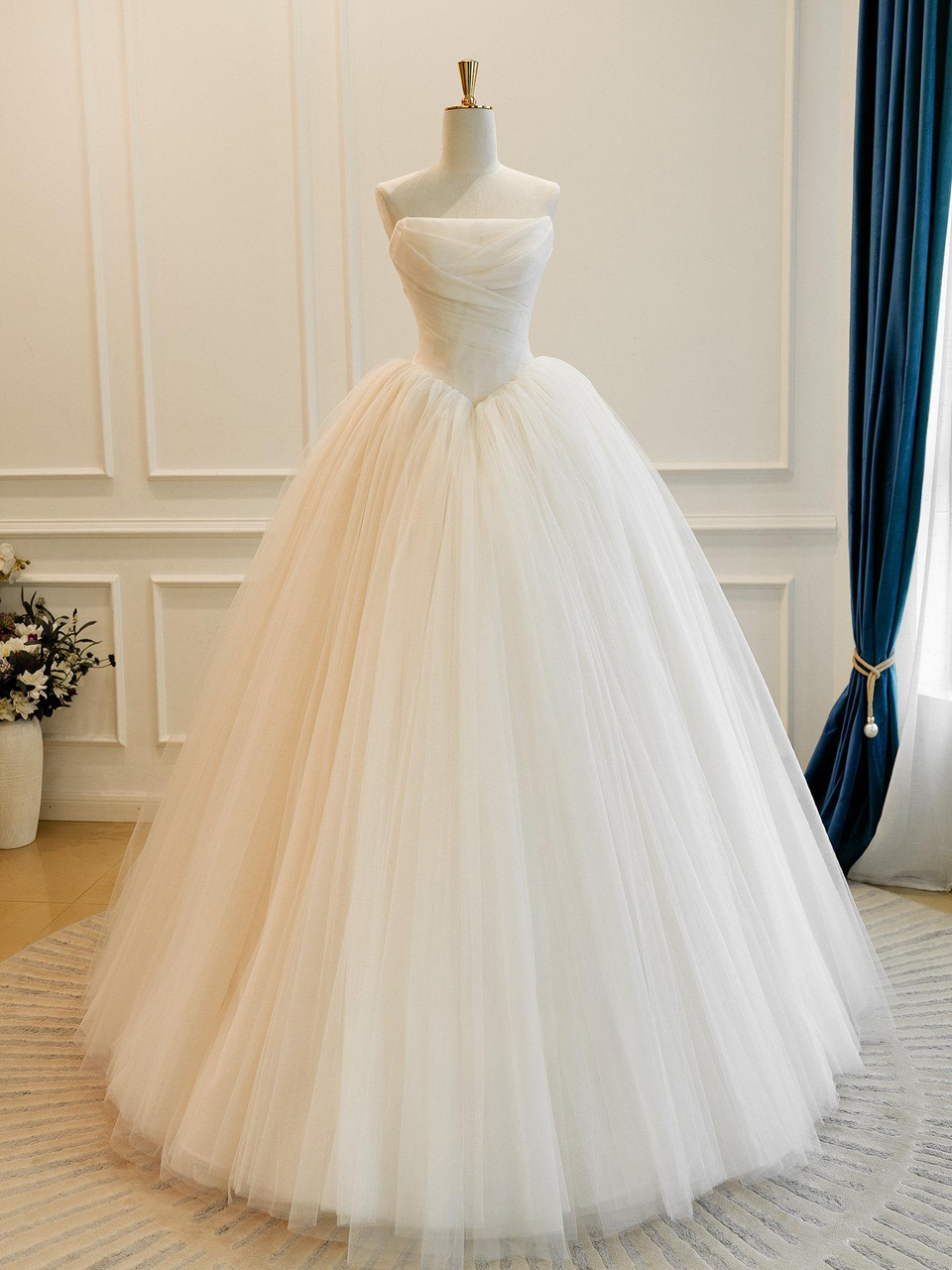 Champagne strapless tulle ball gown wedding dress