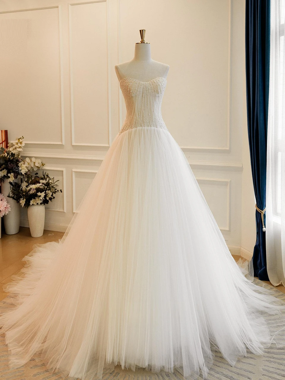 Strapless beaded sweetheart tulle wedding dress
