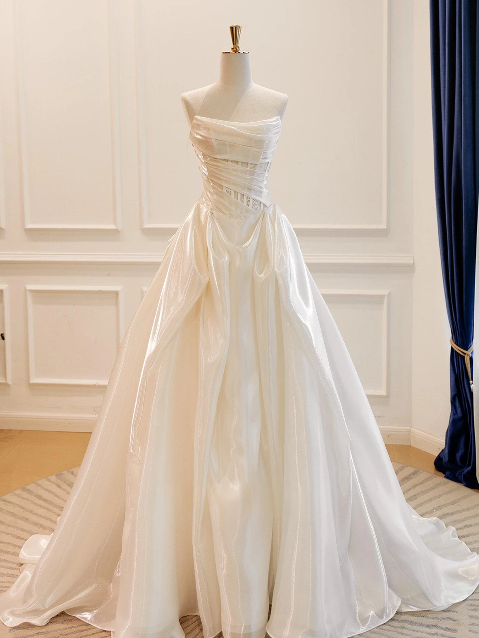 Beige white strapless pleated A line wedding dress with corset bodice