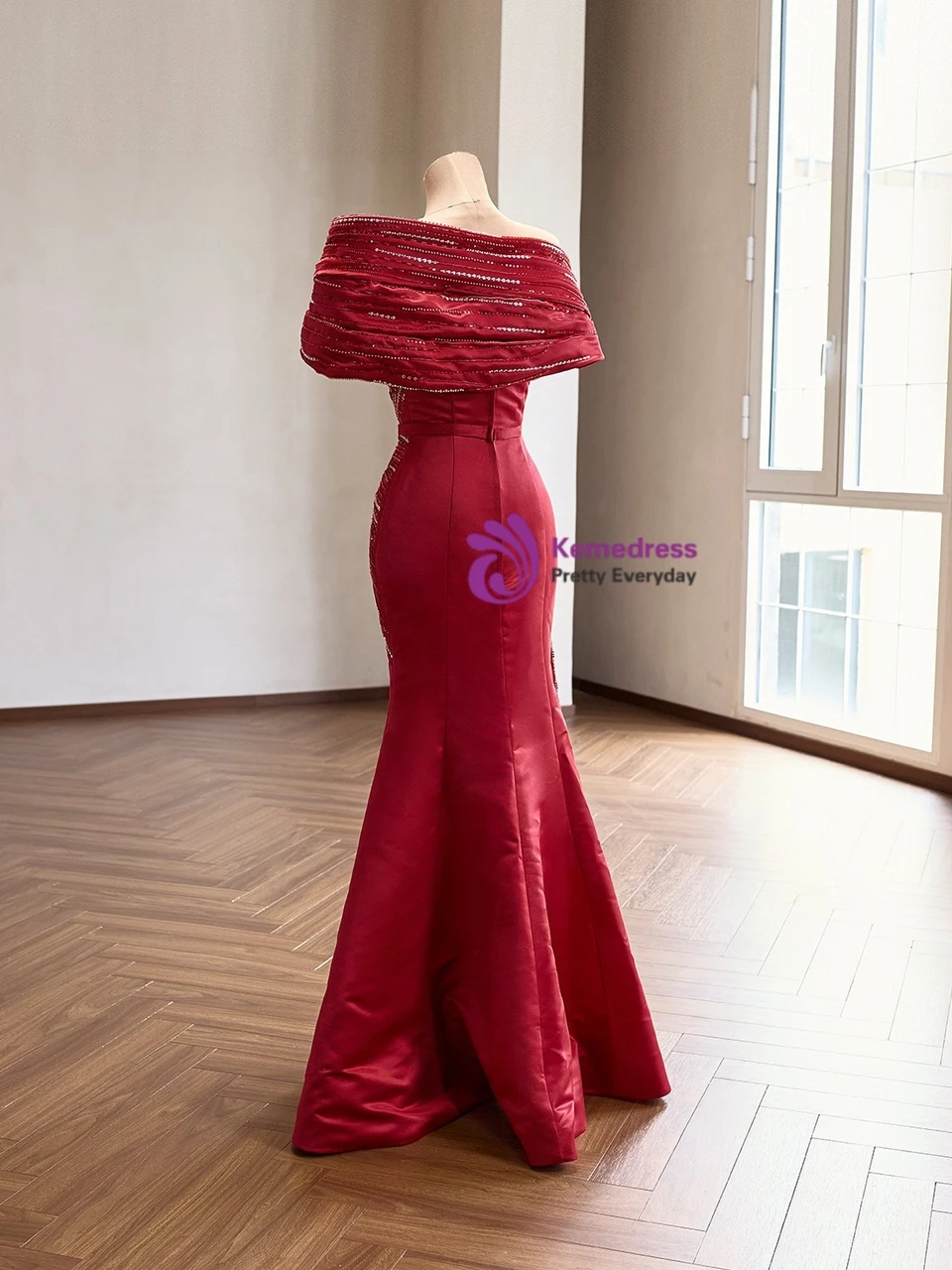 Full back view of the finished red beaded satin mermaid gown