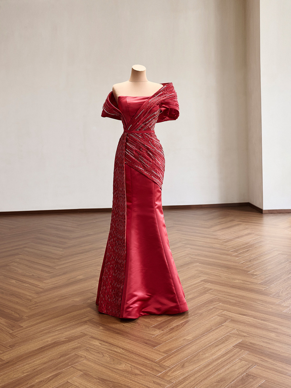 Full front view of the red satin mermaid dress with detachable train removed
