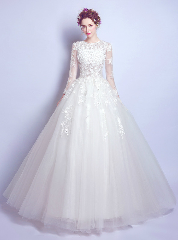 White A-line long sleeve tulle wedding dress with floral bodice and full skirt