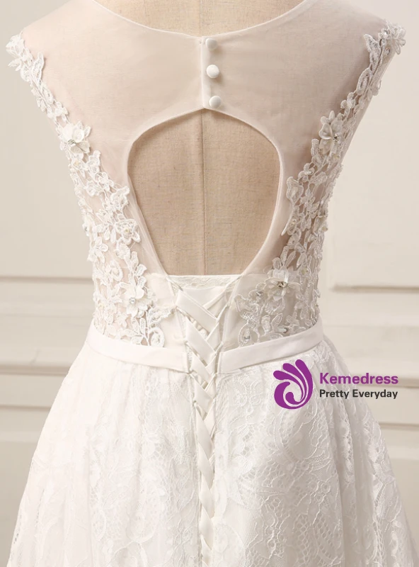 Open back illusion wedding dress with floral lace appliques and lace-up waist