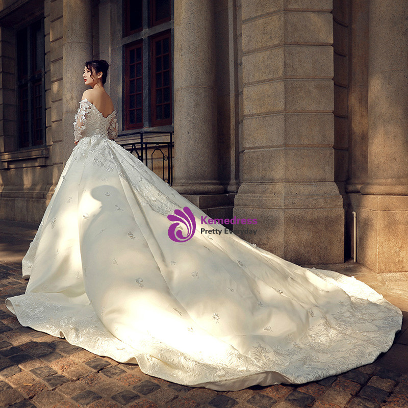 White Ball Gown Off The Shoulder Long Sleeve Backless Wedding Dress
