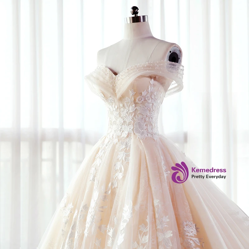 Champagne tulle off shoulder ball gown wedding dress with long train
