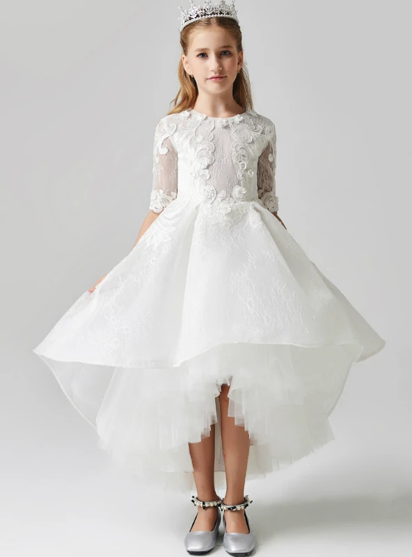 White hi-lo tulle flower girl dress with floral appliqué and short sleeves