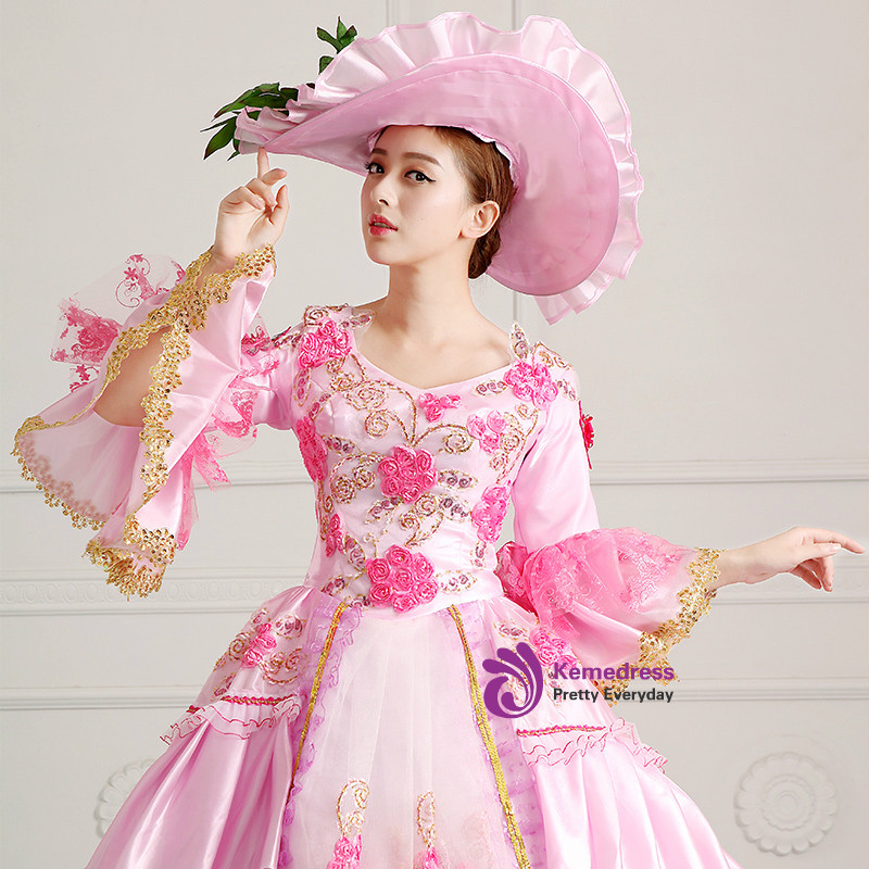 Pink vintage satin ball gown with open front overskirt, tulle panel, rose appliques and gold sequins