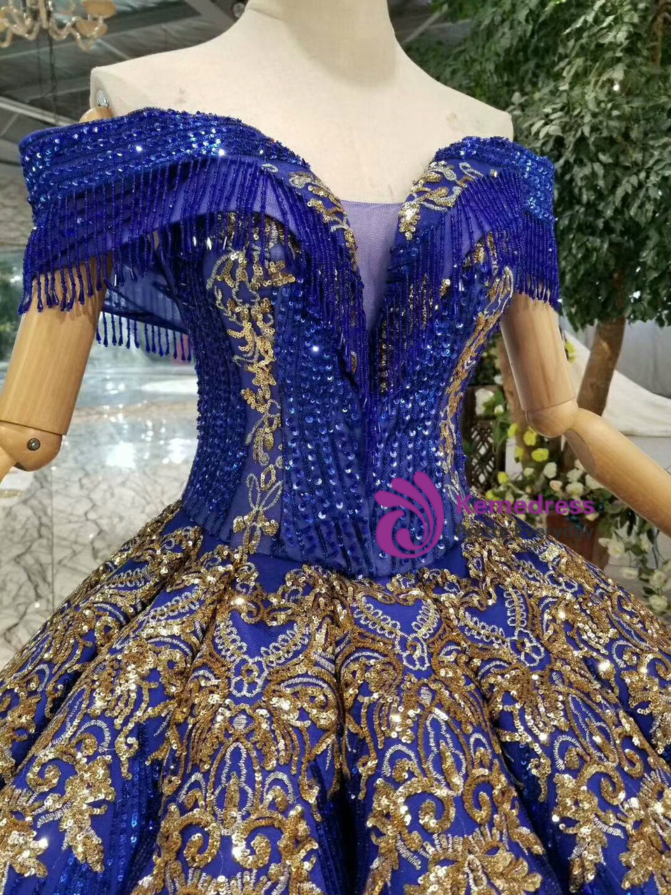 Royal blue sequin ball gown wedding dress with gold floral appliques, off the shoulder neckline and beading
