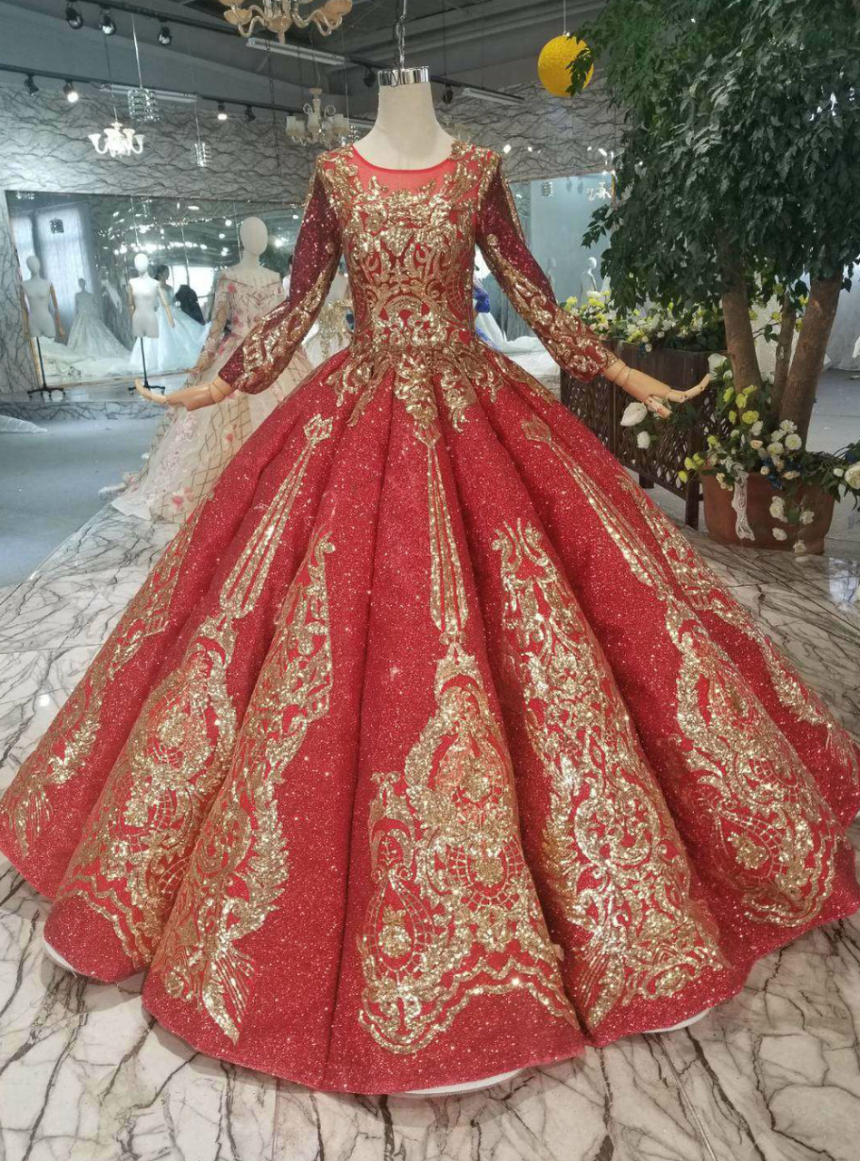 Red sequin ball gown wedding dress with scoop neckline and long sleeves