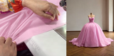 Tracing the Beadwork of a Pink Ball Gown Prom Dress