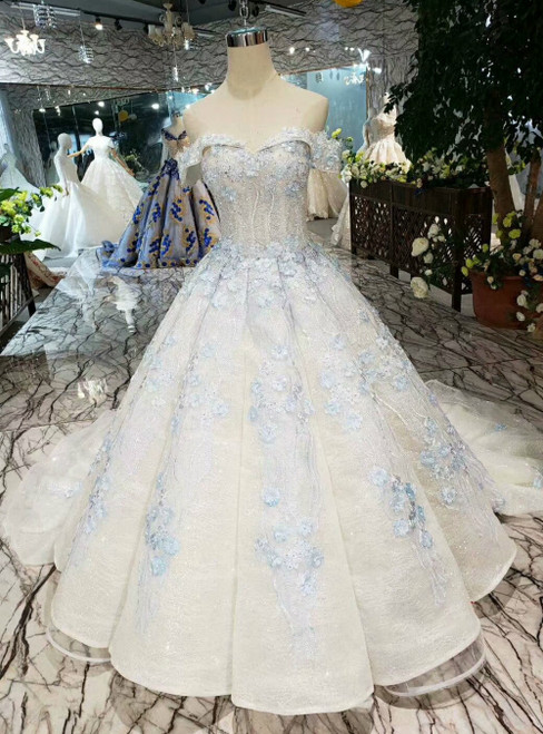 white wedding dress with blue accents