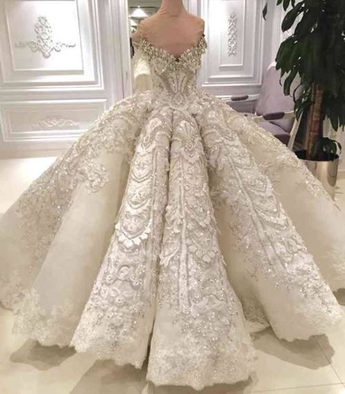 Crystal beaded applique ball gown wedding dress with off the shoulder neckline