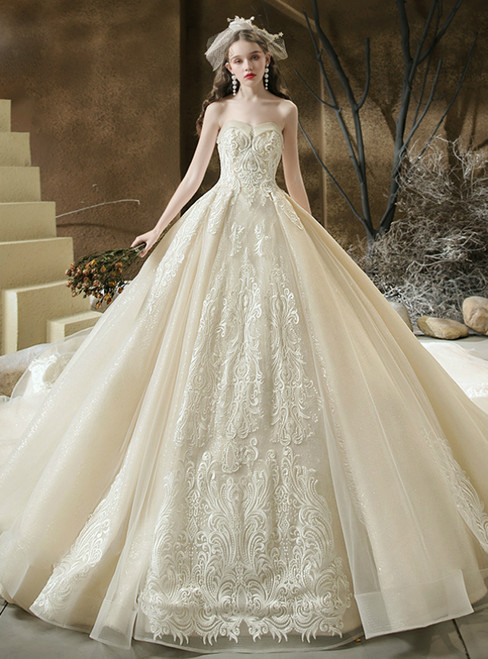 We Offer a Variety Of Tulle Sequins Sweetheart Lace Appliques Beading Champagne Wedding Dress