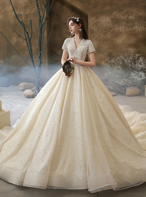 We Provide Champagne Tulle V-neck Short Sleeve Beading Pearls Wedding Dress