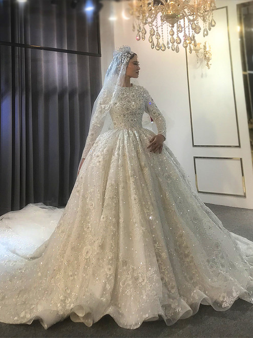 White Muslim Dubai wedding dress with full sequin coverage and long sleeves