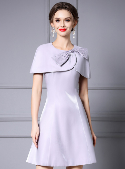 Purple satin short mother of the bride dress with beaded bow detail