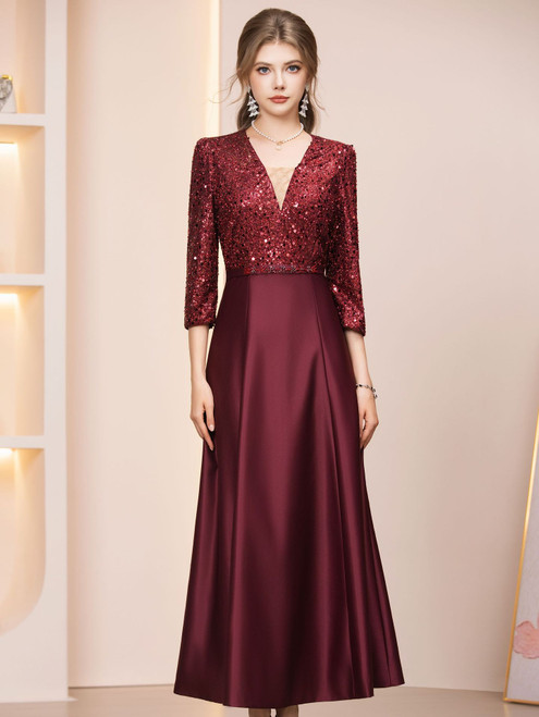 Burgundy satin sequin short sleeve mother of the bride dress with a flattering A-line silhouette