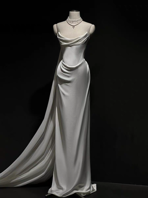 White mermaid strapless satin wedding dress with pleated bodice hugging the curves and flaring below the knee