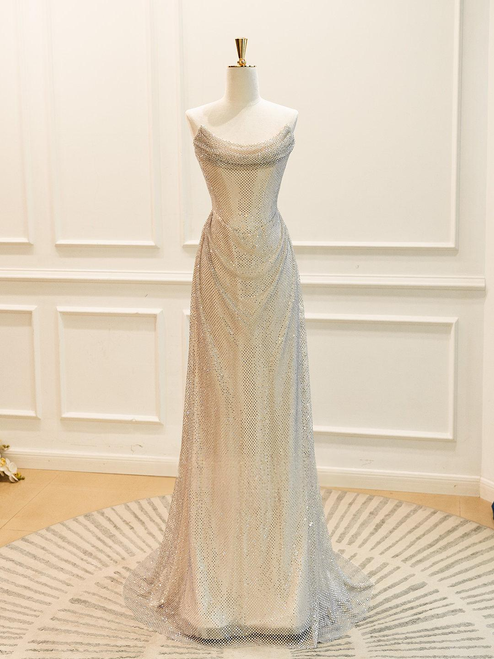 Front view of the silver sparkly strapless mermaid evening gown.