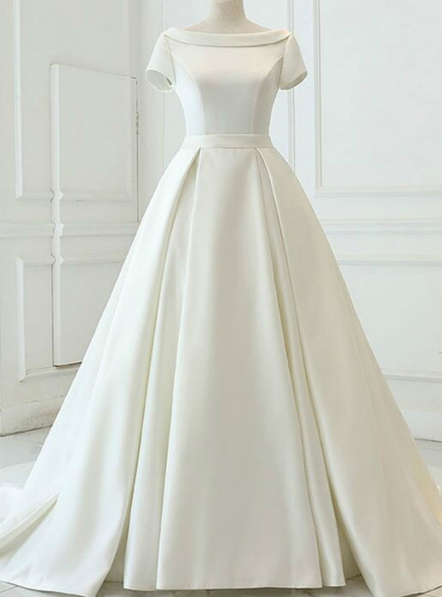 White satin ball gown wedding dress with delicate cap sleeves and a backless design 