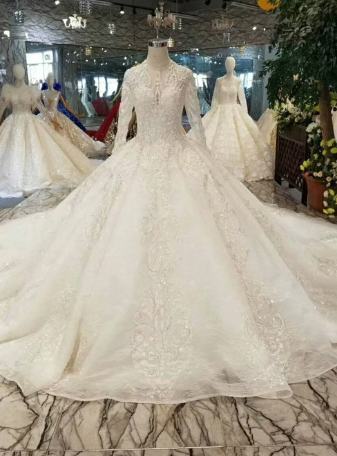 Ball Gown Tulle Lace Appliques Long Sleeve Backless Wedding Dress With Beading