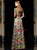 A zipper back that disappears into a garden of lace embroidery on a floor-length mother's dress