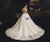 White Ball Gown Bateau Tulle Lace Appliques Long Sleeve Backless Wedding Dress