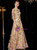 Close-up of delicate floral embroidery on the bodice of a champagne formal gown
