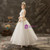 Ankle length bridal dress with a softly flared silhouette