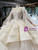 Champagne Ball Gown Tulle Satin Appliques Luxury Wedding Dress With Feather