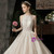 Champagne Tulle Sequins Halter Beading Wedding Dress With Train