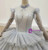 Gray Ball Gown Tulle Long Sleeve High Neck Beading Wedding Dress 2020